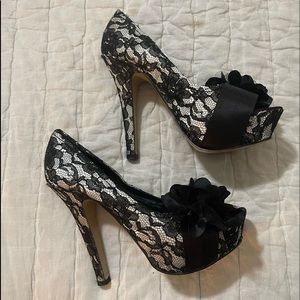 Pre-own Size 9 Black and White lace Heels